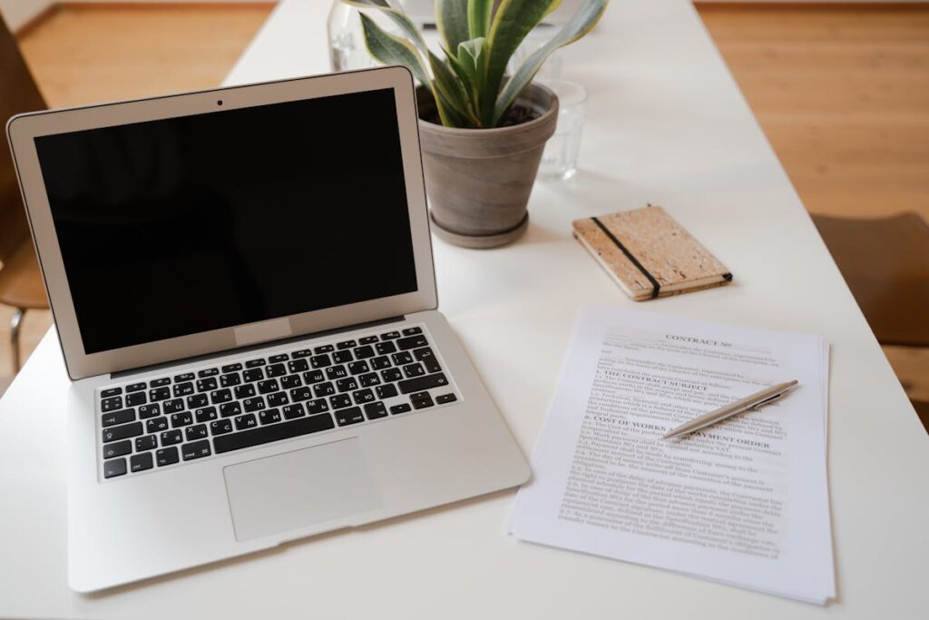 Laptop with documents - DIY IT step by step guide